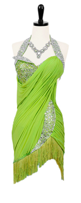 A photo of our Rhythm Latin Chrisanne dress, Pistachio Pizzaz. A vibrant green ballroom dress that is also a rental!