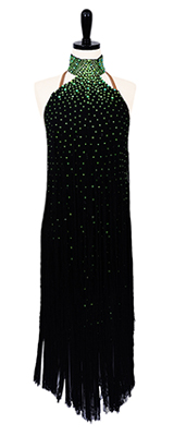 This is a photo of our dress Green Serpent. A black rental Rhythm Latin ballroom dress with fringe.