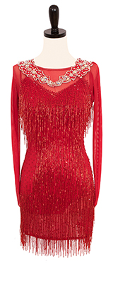 A photo of our Rhythm Latin ballroom dress in red with long sleeves and beaded fringe.