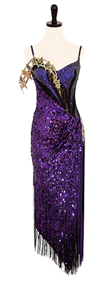 A photo of our Designs to Shine Rhythm Latin, Mercury Rising. A sparkling dress covered in Swarovski crystals and purple sequins!