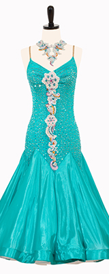This is a photo of our Designs by Irina ballroom costume, Meadowlard. A gorgeous turquoise Smooth Standard dress that will stand out on the ballroom floor!