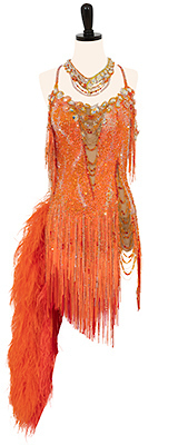 This is a photo of our Rhythm Latin Feather Dress, Fanta Fizz. A pop of color, in a beautiful orange!