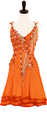 This is a photo of our Rhythm Latin Designs to Shine costume, Orange You Lovin' Me. The question is rhetorical, as we know it's impossible not to love this ballroom dress!