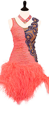 This is a photo of our Designs by Kalina Rhythm Latin ballroom dress, Fly Me Away. A beautiful coral dress with matching coral feathers.